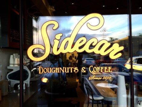 Sidecar Doughnuts & Coffee delivers fresh artisanal doughnuts and coffee to Orange County locals. Costa Mesa, CA.